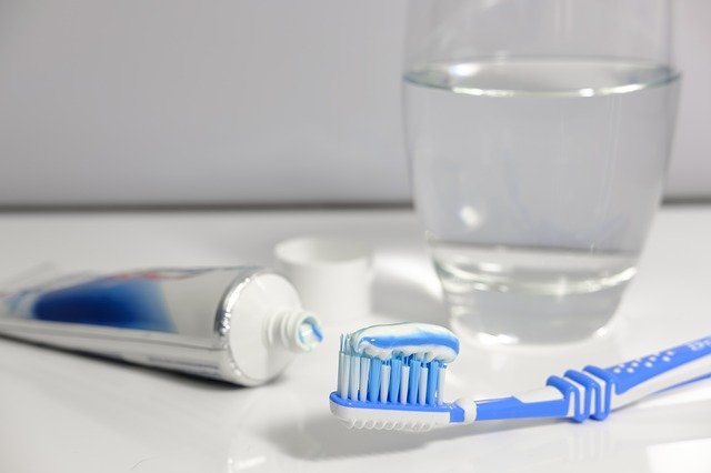 What does fluoride do in protecting your teeth?